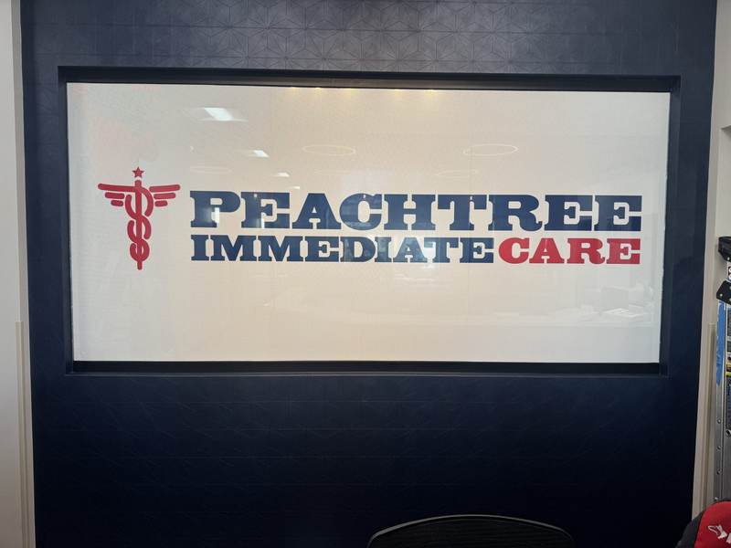 Backlit interior branding panel
